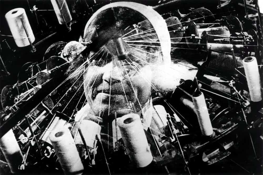 silent film Man With A Movie Camera Head Superimposed On Sewing Machine
